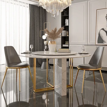 Италианската минималистичная комбинация маса за хранене и столове, изработени от мрамор през цялата модерна лампа луксозна кръгла маса за малка семейство